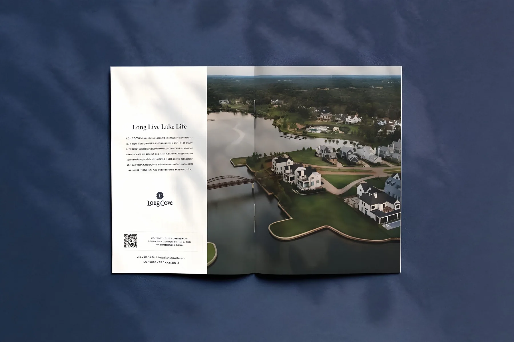 An open Long Cove brochure with an aerial photograph of the lake homes