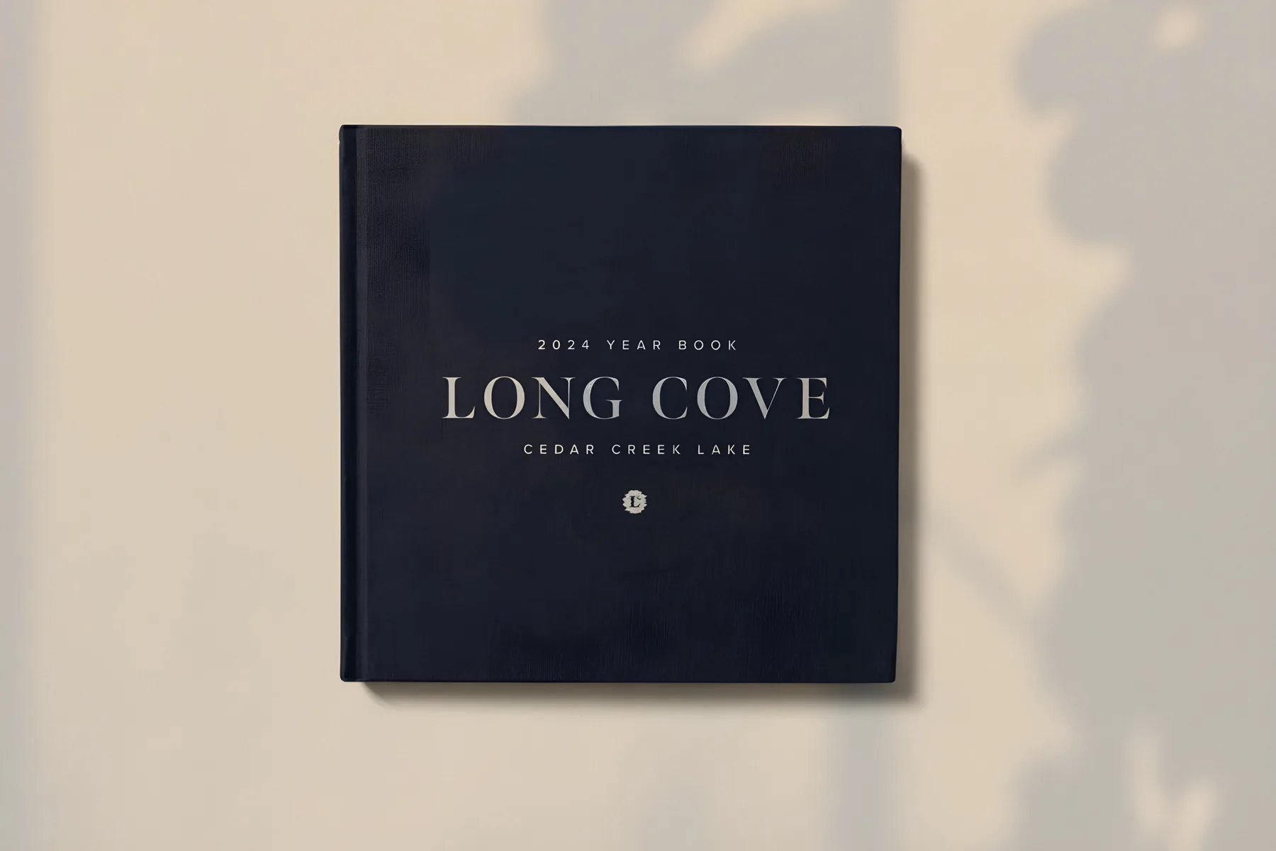 The navy Long Cove 2024 year book