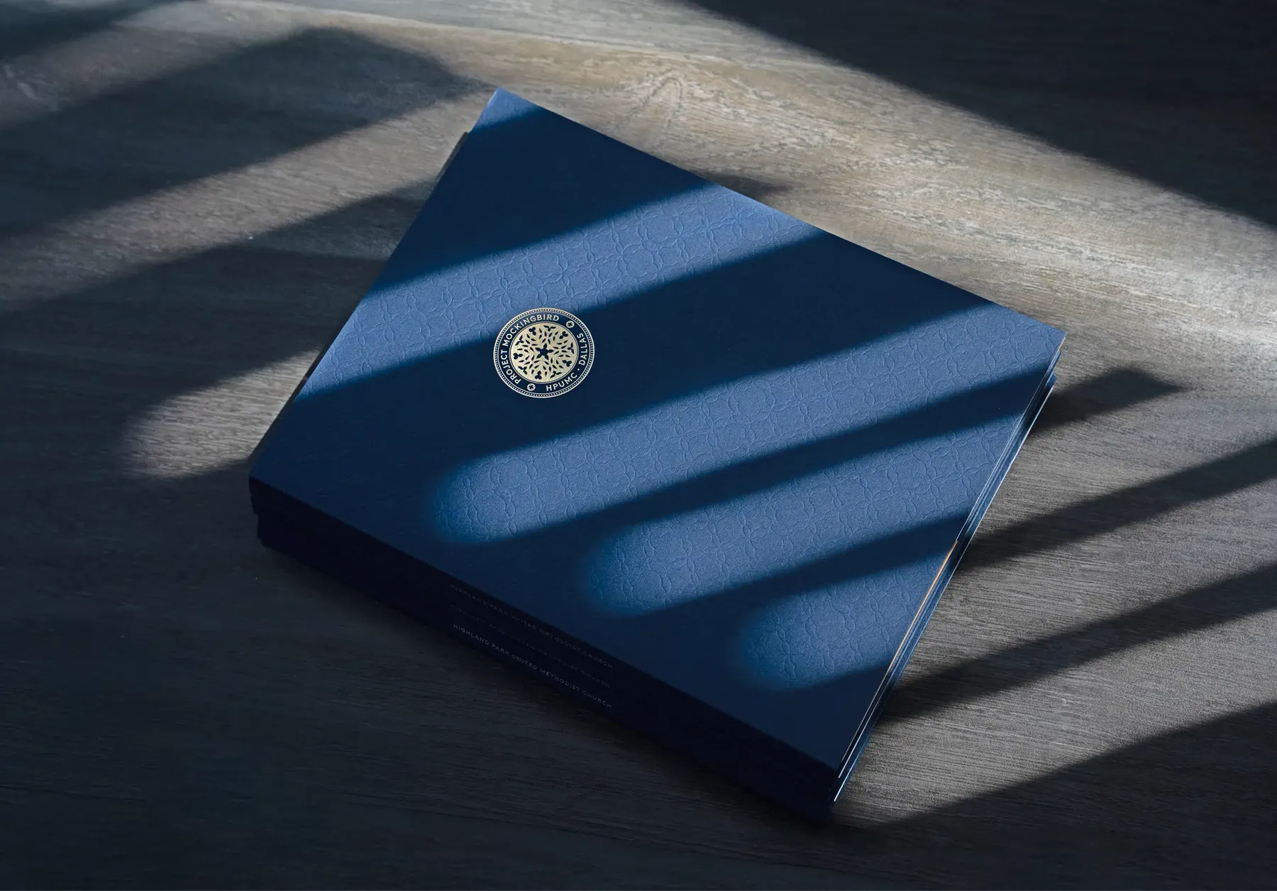 Navy Project Mockingbird campaign book with the HPUMC seal