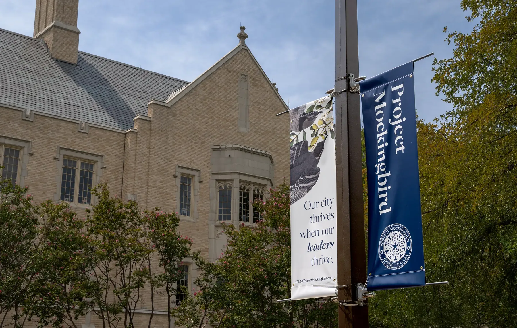 Project Mockingbird street banners outside Highland Park United Methodist Church
